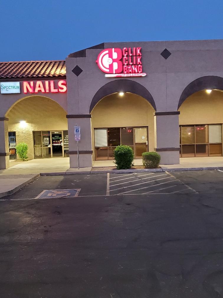 CLIK CLIK BANG storefront at night